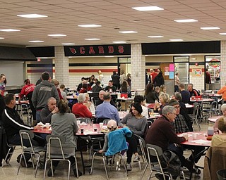 Neighbors | Abby Slanker.A large crowd enjoyed a hot breakfast of pancakes and eggs in the Canfield High School cafeteria at the swim and dive team's annual pancake breakfast on Jan. 6.