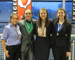 Neighbors | Submitted.Pictured, from left, are Tatiana Caballero, Ashton Gingerich, Claire Berlin and Bridget Fekety, who all placed at the Canton McKinley Tournament during the weekend of Dec. 15. The Canfield High School speech and debate team split up to compete at three different tournaments that weekend.