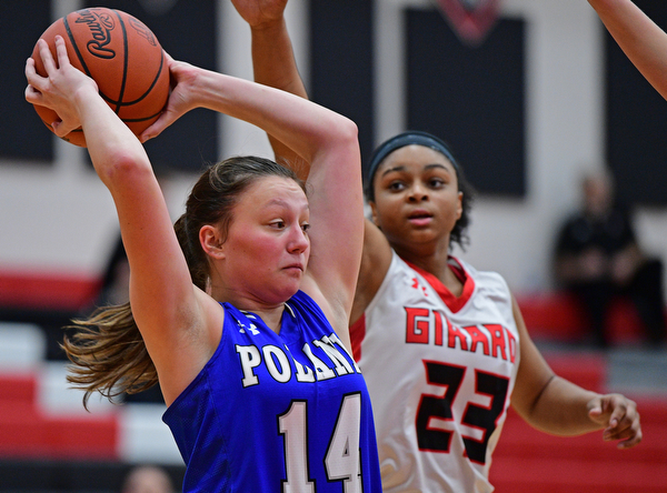GIRARD, OHIO - JANUARY 24, 2019: Poland's Kailyn Brown looks to pass while being pressured by Girard's Jalaya Brown during the first half of their game, Thursday night at Girard High School. DAVID DERMER | THE VINDICATOR