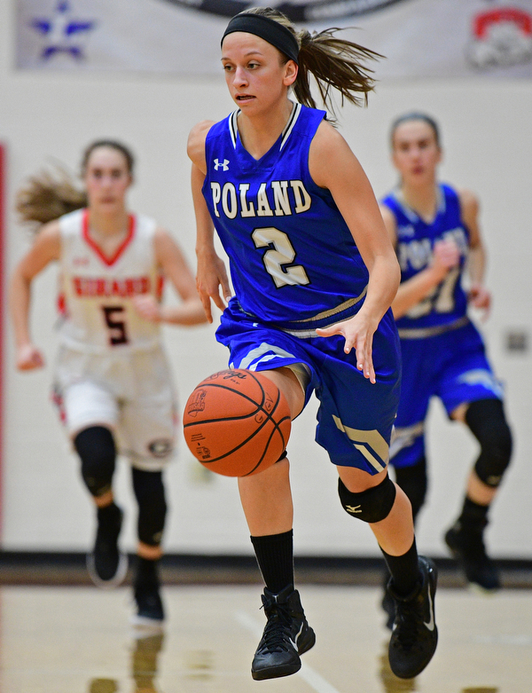 GIRARD, OHIO - JANUARY 24, 2019: Poland's Sarah Bury dribbles in the open court during the first half of their game, Thursday night at Girard High School. DAVID DERMER | THE VINDICATOR