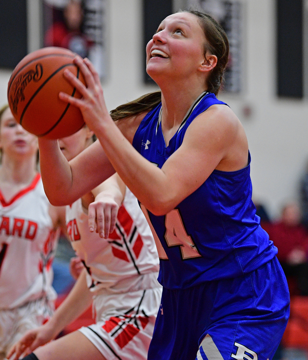 GIRARD, OHIO - JANUARY 24, 2019: Poland's Kailyn Brown goes to the basket during the second half of their game, Thursday night at Girard High School. DAVID DERMER | THE VINDICATOR