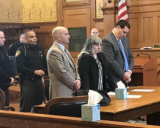 Claudia Hoerig with her lawyers at the moment her guilty verdict is announced.