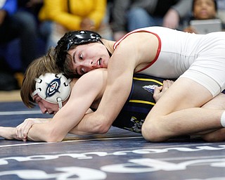 South Range's Kyle Keenan, right, and Copley's Canyon Wells wrestle during the final round of the Josh Hephner Memorial Wrestling Tournament at Austintown Fitch High School on Saturday. Keenan was the champion in the 126 weight class. EMILY MATTHEWS | THE VINDICATOR