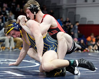 Canfield's David Reinhart, right, and Tallmadge's Richie Eyre wrestle during the final round of the Josh Hephner Memorial Wrestling Tournament at Austintown Fitch High School on Saturday. Reinhart was the champion in the 160 weight class. EMILY MATTHEWS | THE VINDICATOR