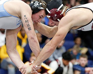 Boardman's Mike O'Horo, right, and Willoughby South's Justin Hendershot wrestle during the final round of the Josh Hephner Memorial Wrestling Tournament at Austintown Fitch High School on Saturday. Hendershot was the champion in the 170 weight class. EMILY MATTHEWS | THE VINDICATOR