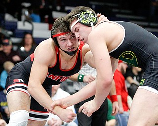 Canfield's Nick Crawford, left, and Medina's Blake Chrisman wrestle during the final round of the Josh Hephner Memorial Wrestling Tournament at Austintown Fitch High School on Saturday. Crawford was the champion in the 195 weight class. EMILY MATTHEWS | THE VINDICATOR