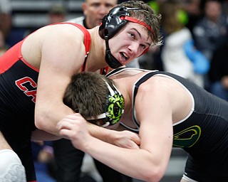 Canfield's Nick Crawford, left, and Medina's Blake Chrisman wrestle during the final round of the Josh Hephner Memorial Wrestling Tournament at Austintown Fitch High School on Saturday. Crawford was the champion in the 195 weight class. EMILY MATTHEWS | THE VINDICATOR