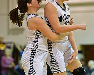 McDONALD, OHIO - JANUARY 28, 2019: McDonald's Molly Howard, right, and Taylor Tuchek celebrates after defeating Western Reserve 56-55 in overtime, Monday night at McDonald High School. DAVID DERMER | THE VINDICATOR