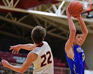 CANFIELD, OHIO - JANUARY 29, 2019: Poland's Braeden O'Shaughnessy intercepts a pass intended for South Range's Nick Matos during the second half of their game, Tuesday night at South Range High school. DAVID DERMER | THE VINDICATOR