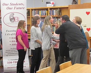 Neighbors | Jessica Harker.Teachers from various Boardman schools shook hands with representatives from the Boardman School Board and the Boardman Schools Fund for Educational Excellence at a news conference honoring grant recipients Jan. 8.