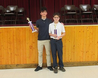 Neighbors | Jessica Harker.Spelling Bee winner Noah Lytle and runner up Anthony Yarger competed in St. Christine's annual school wide spelling bee Jan. 17.