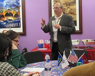 Neighbors | Jessica Harker.Chip Merkle from the ODE Purple Star Committee discussed education resources from students in military families on Jan. 23 at Austintown Fitch High School's Purple Star room.