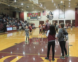 Neighbors | Jessica Harker.Mike Zoccali, principal of Stadium Drive Elementary School, rebounded basketballs for students Jan. 25 at the Boardman High School basket ball team's Elementary School Night.