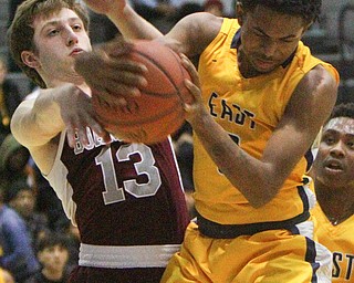 William D. Lewis The Vindicator  East's Deland Richardson(3) andin by Boardman'sConnor Miller(13) during 2-1-19 action at East.