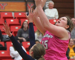 William D. Lewis The Vindicator YSU's Mary Dunn(15) shoots over Detroits Jess Bicknell(13) during 2-2-19 action at YSU.