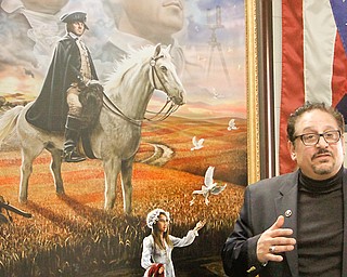 Local artist Ray Simon speaks Monday with Austintown Middle School students about “Divine Providence,” an allegorical painting detailing the life of President George Washington. The painting will be unveiled later this week at the George Washington Presidential Library in Mount Vernon, Va.