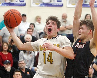 William D. Lewis The vindicator Lowellvilles Matt Hvisdak(14) shoots past Springfields Evan Ohlin(1) during 2-5-19 action in Lowellville.