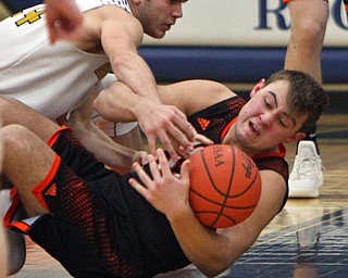 William D. Lewis The vindicator Lowellvilles Joe Ballone and Springfields Shane Enyon(12) during 2-5-19 action in Lowellville
