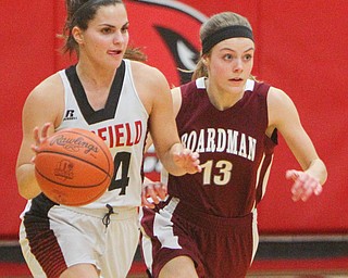 William D. Lewis The Vindicator Boardman's Canfield's Serena Sammarone(54) drives around Boardman's Kate Green(13).