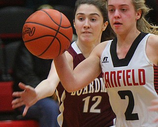 William D. Lewis The VindicatorCanfield's Summer Sammarone(2) passes around Boardman'sBailey Moore(12).