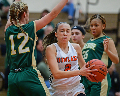 HOWLAND, OHIO - FEBRUARY 6, 2019: Howland's Maria Dellimuti drives on Lakeside's Makenna Condon during the first half of their game, Wednesday night at Howland High School. Howland won 89-40. DAVID DERMER | THE VINDICATOR