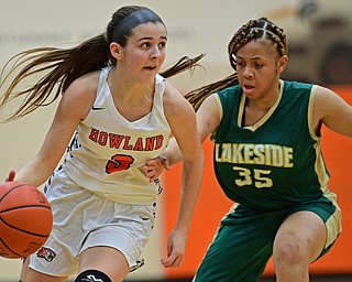 HOWLAND, OHIO - FEBRUARY 6, 2019:Howland's Ashley Chambers drives on Lakeside's Deahrah Williams during the first half of their game, Wednesday night at Howland High School. Howland won 89-40. DAVID DERMER | THE VINDICATOR