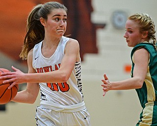 HOWLAND, OHIO - FEBRUARY 6, 2019: Howland's Jenna Craigo looks to pass while being pressured by Lakeside's Makenna Condon during the first half of their game, Wednesday night at Howland High School. Howland won 89-40. DAVID DERMER | THE VINDICATOR