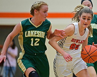 HOWLAND, OHIO - FEBRUARY 6, 2019:Howland's Jenna Craigo drives on Lakeside's Makenna Condon during the second half of their game, Wednesday night at Howland High School. Howland won 89-40. DAVID DERMER | THE VINDICATOR