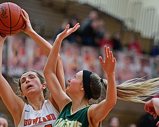 HOWLAND, OHIO - FEBURARY 6, 2019: Howland's Jenna Desalvo grabs a rebound away from Lakeside's Dani Melnik during the second half of their game, Wednesday night at Howland High School. Howland won 89-40. DAVID DERMER | THE VINDICATOR