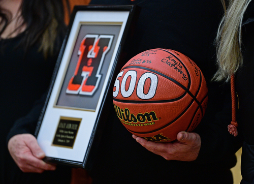 HOWLAND, OHIO - FEBURARY 6, 2019:Howland head coach John Diehl holds a basketball and plaque given to him to celebrate his 500th career win after Howland defeated Lakeside 89-40, Wednesday night at Howland High School. DAVID DERMER | THE VINDICATOR