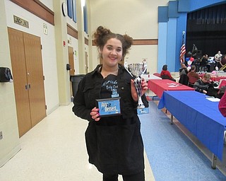 Neighbors | Jessica Harker.Mercedes Santiago received first place Amateur Baker at Austintown Fitch High School's annual Jazz and Dessert event on Jan. 26.