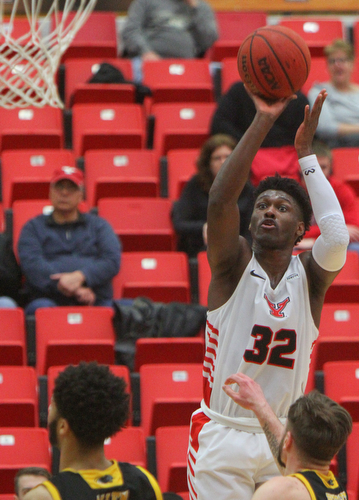 William D. Lewis The Vindicator YSU'sGarrett Covington(32) goes for 2 during 2-7-19 action at YSU.