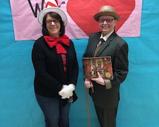 Neighbors | Submitted.Teachers Terri Rasor and Teresa Lord dressed up as the Cat and the Hat and Mr. Morris Lessmore, celebrating their favorite books for World Read Aloud Day on Feb. 1.
