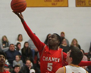 William D. Lewis the Vindicator  Mooney'sCam Lawrence(5) and Chaney's Anthony Fire(11) during 2-8-19 action at Mooney.