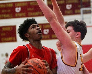 William D. Lewis the Vindicator  Chaney's Marqel Gillispie(3) and Mooney's  Mike Pelini(14) during 2-8-19 action at Mooney.