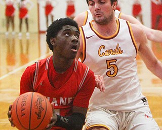 William D. Lewis the Vindicator  Mooney's Pete Haas(5) and Chaney's  Jamison Tubbs (1) during 2-8-19 action at Mooney.