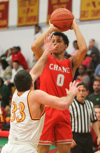 William D. Lewis the Vindicator Chaney's Sharrod Taylor (0) shoots a 3 past Mooney's John Murphy (33) during 2-8-19 action at Mooney.