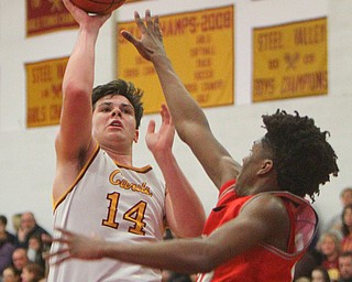 William D. Lewis the Vindicator  Mooney's Mike Pelini(14) and Chaney's Quincy Jones(22) during 2-8-19 action at Mooney.