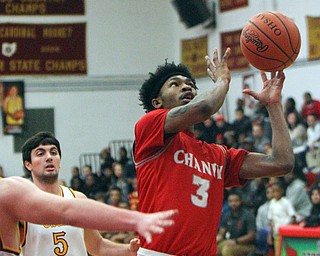 William D. Lewis the Vindicator  Mooney's Pete Haas(5) and Chaney's Marqel Gillispie (3) during 2-8-19 action at Mooney.