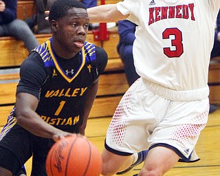 William D. Lewis The Vindicator  JFK's Jody Hayes(3) defends against  VCS's Lohron Brown(1 during 2-11-19 action at JFK.