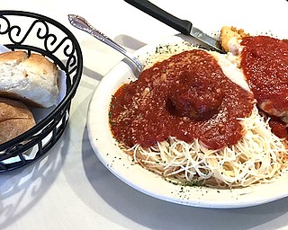 Marino’s specializes in Italian fare, including Chicken Parmesiana, a breaded and fried chicken breast topped with tomato sauce and Italian cheeses.
Entrees are served with a choice of pasta or potato.

Special to The Vindicator
 
