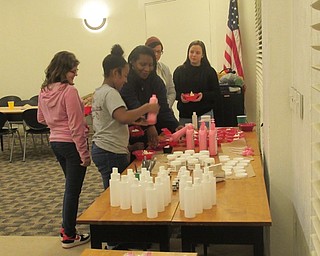 Neighbors | Jessica Harker.Community members gathered supplies used to create a DIY lotion Jan. 24 at the Austintown library.