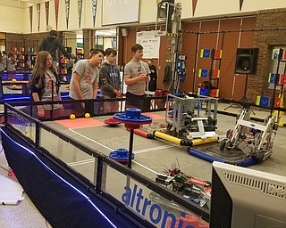 Neighbors | Submitted .Austintown High School students stood around the Vex Robotics Competition arena Feb. 2 at Mahoning County Career and Technical Center.