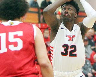 William D. Lewis YSU's NazBohannon(33) shoots over IUPUI's Ahmed Ismail(15) during 2-14-19 action at YSU.