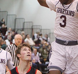 William D. Lewis The Vindicator Boardman's Derrick Anderson(3) tries to block Canfield's Kyle Gamble(24) during 2-15-19 action at Boardman.