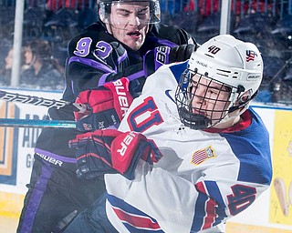 Scott R. Galvin | The Vindicator.Youngstown Phantoms forward Liam Robertson (92) checks Team USA NTDP Owen Gallatin (40) during the second period at the Covelli Centre on Saturday, February 15, 2019.