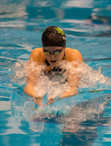 Jamyson Robb of West Branch goes into a turn in the 100-yard breaststroke at the Division II district swim meet at Cleveland State’s Robert F. Busby Natatorium on Friday..￼.