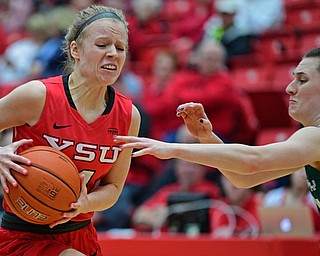 YOUNGSTOWN, OHIO - FEBRUARY 15, 2019: Youngstown State's Melinda Trimmer drives on Green Bay's Meghan Pringle during the first half of their game, Friday night at Beeghly Center. DAVID DERMER | THE VINDICATOR