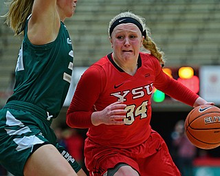 YOUNGSTOWN, OHIO - FEBRUARY 15, 2019: Youngstown State's McKenah Peters drives on Green Bay's Carly Mohns during the second half of their game, Friday night at Beeghly Center. Youngstown State won 70-59. DAVID DERMER | THE VINDICATOR