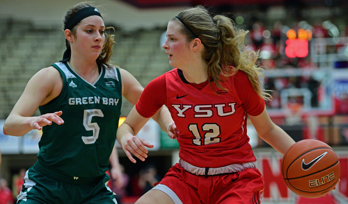 YOUNGSTOWN, OHIO - FEBRUARY 15, 2019: Youngstown State's Chelsea Olson looks to pass against Green Bay's Laken James during the second half of their game, Friday night at Beeghly Center. Youngstown State won 70-59. DAVID DERMER | THE VINDICATOR